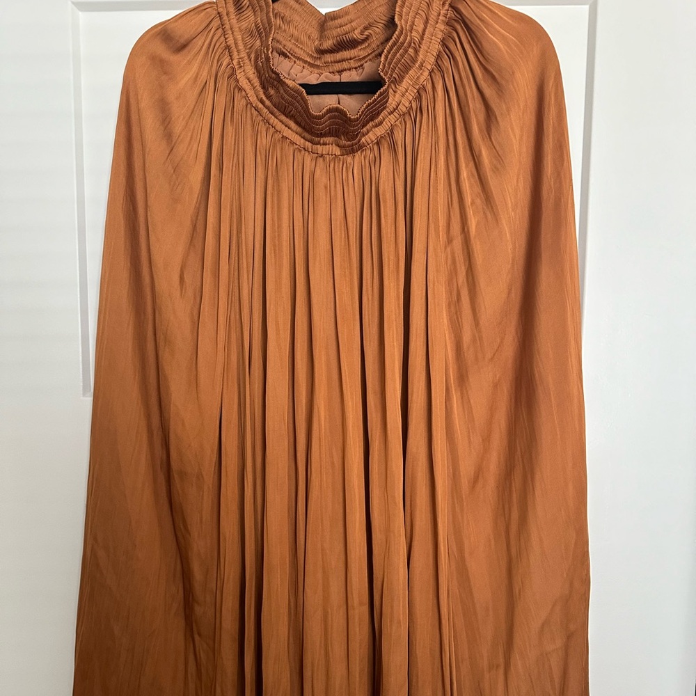 Beautiful, silky, golden, burnt orange skirt.